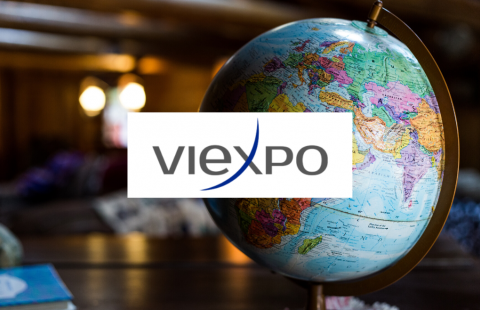 Karttapallo ja Viexpon logo.