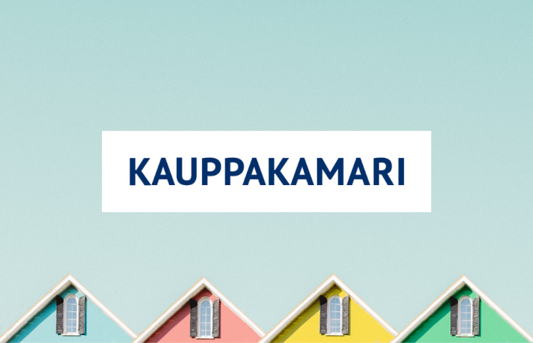 Kauppakamarin logo ja pastellisävyiset talojen katot.